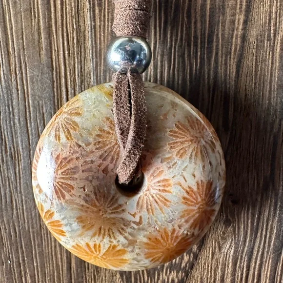 Light Yellow Coral Fossil Donut Pendant Necklace on Brown Faux Suede - Picture 2 of 11